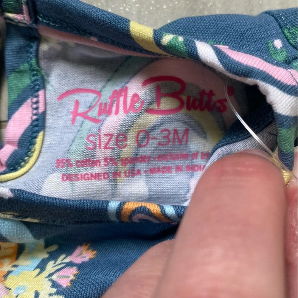 NWT RuffleButts Dark Blue & Pink Floral Rainbows Ruffles Bubble Romper, 0-3M